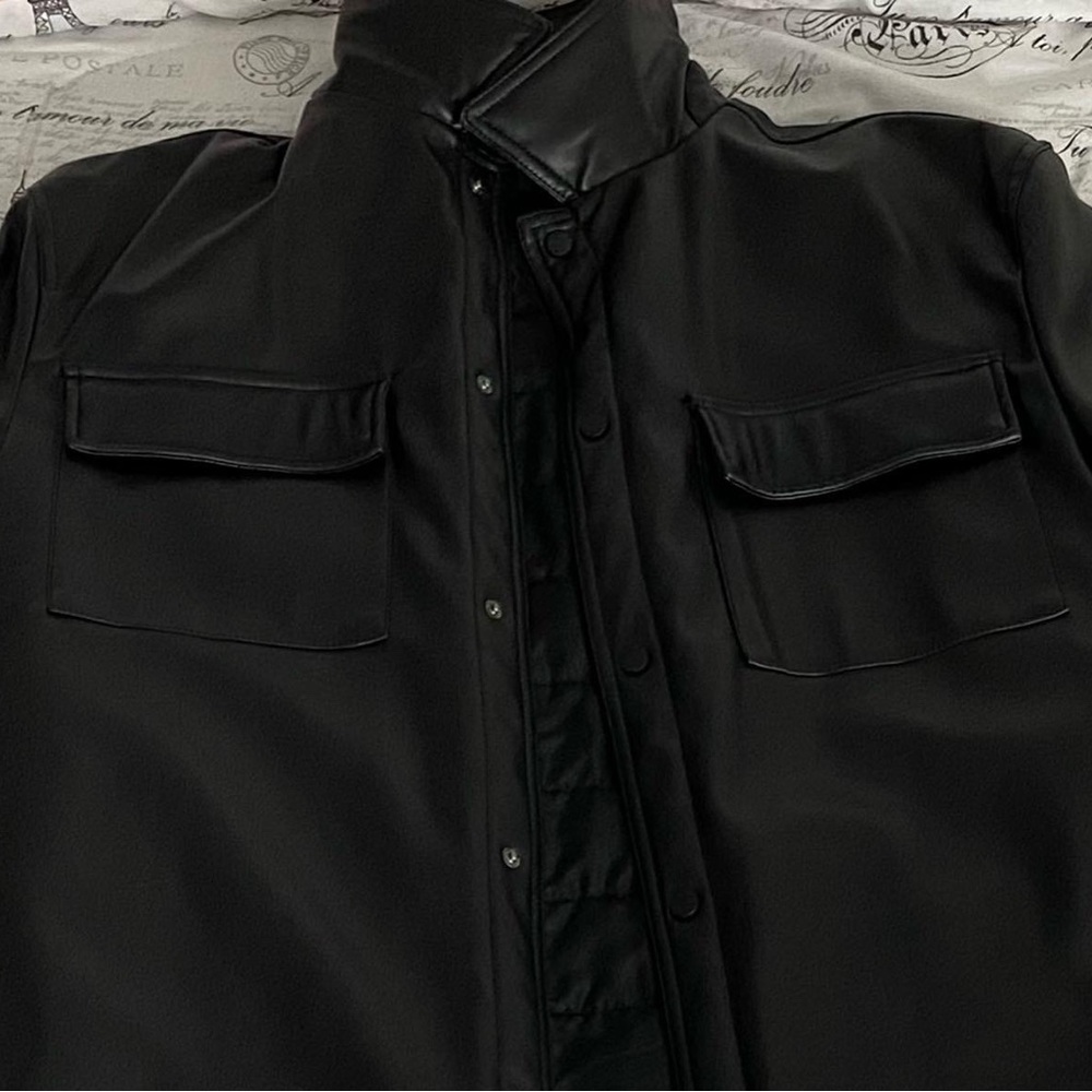 faux leather jacket, with polyester lining , high collar, and long sleeves<3